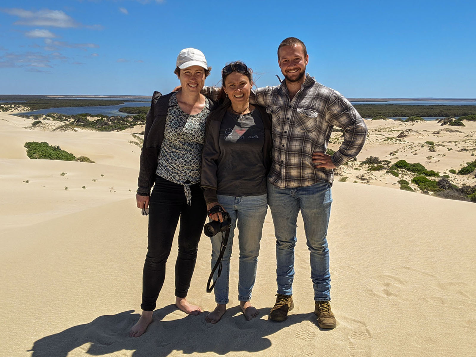 people exploring coastal dunes atdw